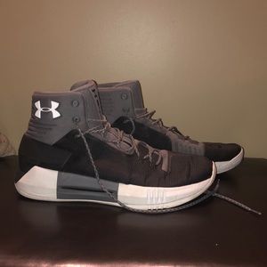 High top Under Armour basketball shoes